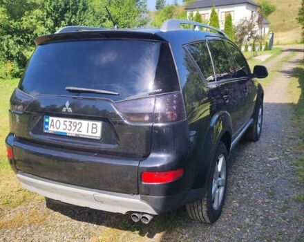 Чорний Міцубісі Аутлендер, об'ємом двигуна 2 л та пробігом 283 тис. км за 9000 $, фото 15 на Automoto.ua