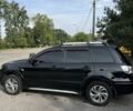Черный Мицубиси Аутлендер, объемом двигателя 2.4 л и пробегом 333 тыс. км за 5999 $, фото 5 на Automoto.ua