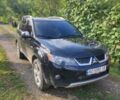 Чорний Міцубісі Аутлендер, об'ємом двигуна 2 л та пробігом 283 тис. км за 9000 $, фото 5 на Automoto.ua