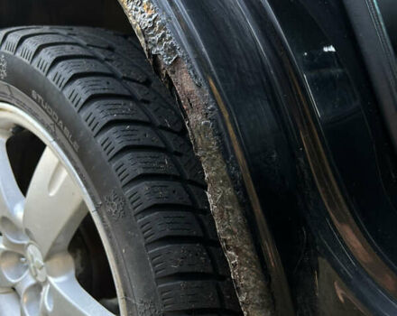 Мицубиси Аутлендер 2006 в Чернобае на Automoto.ua Черный Мицубиси Аутлендер, объемом двигателя 2.38 л и пробегом 278 тыс. км за 5300 $, фото 15 на Automoto.ua