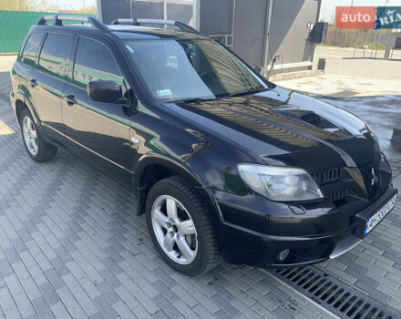 Черный Мицубиси Аутлендер, объемом двигателя 2 л и пробегом 212 тыс. км за 6000 $, фото 10 на Automoto.ua