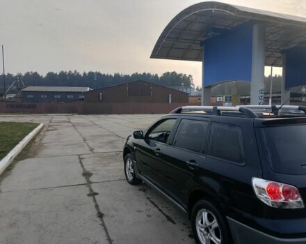 Черный Мицубиси Аутлендер, объемом двигателя 2 л и пробегом 169 тыс. км за 3500 $, фото 4 на Automoto.ua