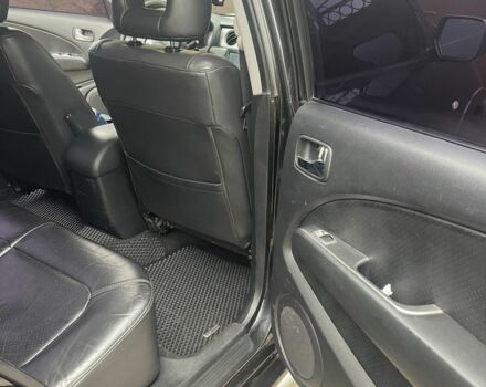 Чорний Міцубісі Аутлендер, об'ємом двигуна 2.4 л та пробігом 277 тис. км за 6700 $, фото 10 на Automoto.ua