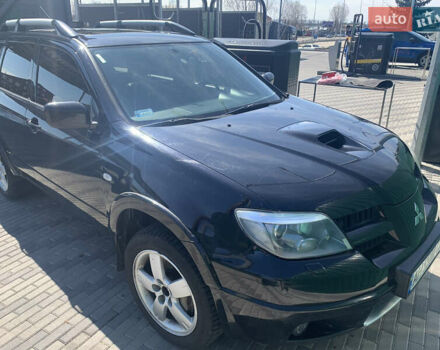 Черный Мицубиси Аутлендер, объемом двигателя 2 л и пробегом 212 тыс. км за 6000 $, фото 27 на Automoto.ua