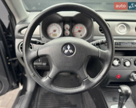 Черный Мицубиси Аутлендер, объемом двигателя 2.4 л и пробегом 242 тыс. км за 6800 $, фото 32 на Automoto.ua