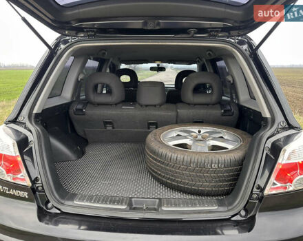 Черный Мицубиси Аутлендер, объемом двигателя 2 л и пробегом 230 тыс. км за 6300 $, фото 16 на Automoto.ua