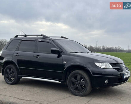 Черный Мицубиси Аутлендер, объемом двигателя 2 л и пробегом 230 тыс. км за 6300 $, фото 8 на Automoto.ua