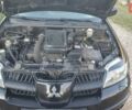 Міцубісі Аутлендер 2006 у Івано-Франківську на Automoto.ua Чорний Міцубісі Аутлендер, об'ємом двигуна 2 л та пробігом 263 тис. км за 7250 $, фото 9 на Automoto.ua