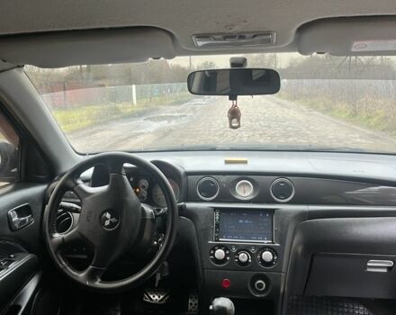 Черный Мицубиси Аутлендер, объемом двигателя 2.4 л и пробегом 310 тыс. км за 5300 $, фото 7 на Automoto.ua