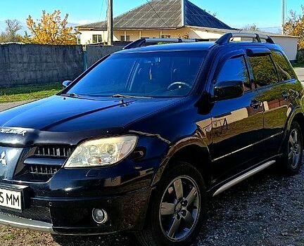 Міцубісі Аутлендер 2006 у Дніпро (Дніпропетровську) на Automoto.ua Чорний Міцубісі Аутлендер, об'ємом двигуна 2.4 л та пробігом 265 тис. км за 7500 $, фото 5 на Automoto.ua
