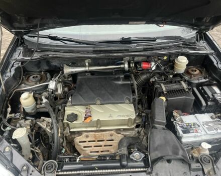 Черный Мицубиси Аутлендер, объемом двигателя 2.4 л и пробегом 310 тыс. км за 5300 $, фото 6 на Automoto.ua