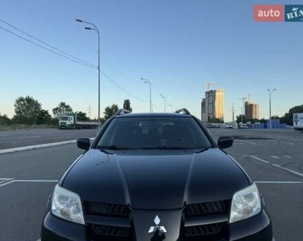 Черный Мицубиси Аутлендер, объемом двигателя 2 л и пробегом 158 тыс. км за 6700 $, фото 35 на Automoto.ua