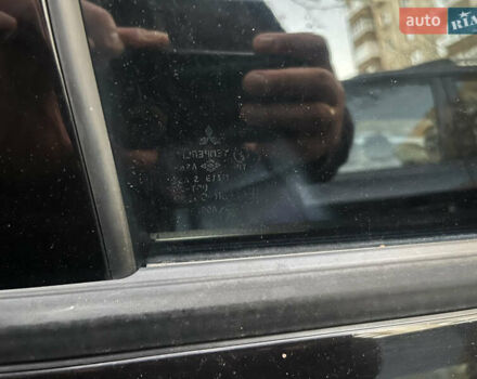 Чорний Міцубісі Аутлендер, об'ємом двигуна 2.38 л та пробігом 247 тис. км за 5499 $, фото 76 на Automoto.ua