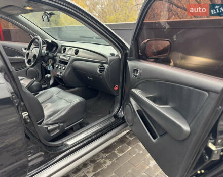 Черный Мицубиси Аутлендер, объемом двигателя 2.4 л и пробегом 242 тыс. км за 6800 $, фото 50 на Automoto.ua