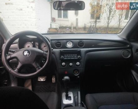 Черный Мицубиси Аутлендер, объемом двигателя 2.4 л и пробегом 280 тыс. км за 5455 $, фото 6 на Automoto.ua