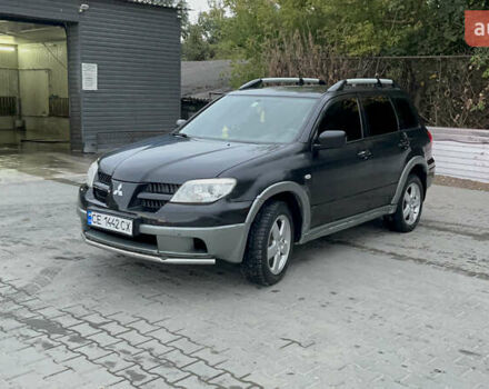 Черный Мицубиси Аутлендер, объемом двигателя 2 л и пробегом 280 тыс. км за 4999 $, фото 3 на Automoto.ua