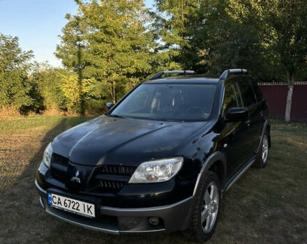 Мицубиси Аутлендер 2006 в Чернобае на Automoto.ua Черный Мицубиси Аутлендер, объемом двигателя 2.38 л и пробегом 278 тыс. км за 5300 $, фото 1 на Automoto.ua