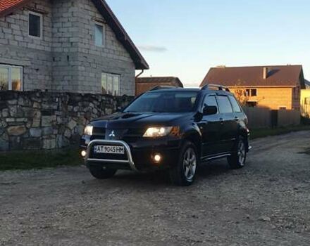 Міцубісі Аутлендер 2006 у Івано-Франківську на Automoto.ua Чорний Міцубісі Аутлендер, об'ємом двигуна 2 л та пробігом 263 тис. км за 7250 $, фото 13 на Automoto.ua