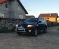 Міцубісі Аутлендер 2006 у Івано-Франківську на Automoto.ua Чорний Міцубісі Аутлендер, об'ємом двигуна 2 л та пробігом 263 тис. км за 7250 $, фото 13 на Automoto.ua