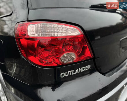 Черный Мицубиси Аутлендер, объемом двигателя 2.4 л и пробегом 242 тыс. км за 6800 $, фото 17 на Automoto.ua