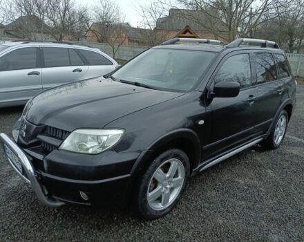 Черный Мицубиси Аутлендер, объемом двигателя 2 л и пробегом 200 тыс. км за 5100 $, фото 11 на Automoto.ua