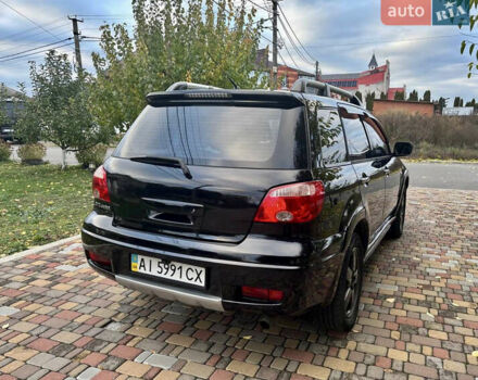 Чорний Міцубісі Аутлендер, об'ємом двигуна 2.38 л та пробігом 247 тис. км за 5499 $, фото 22 на Automoto.ua