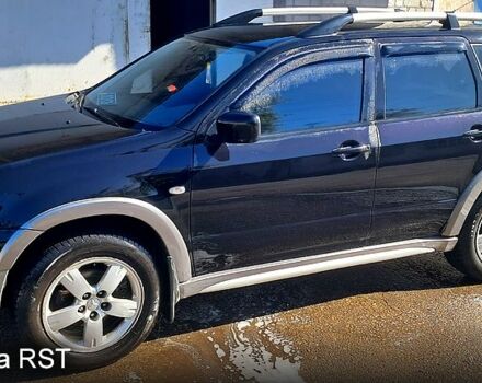 Черный Мицубиси Аутлендер, объемом двигателя 2.4 л и пробегом 185 тыс. км за 7500 $, фото 9 на Automoto.ua