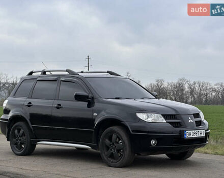 Черный Мицубиси Аутлендер, объемом двигателя 2 л и пробегом 230 тыс. км за 6300 $, фото 12 на Automoto.ua