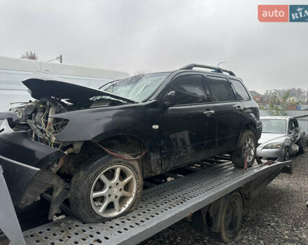 Черный Мицубиси Аутлендер, объемом двигателя 2.4 л и пробегом 240 тыс. км за 2200 $, фото 12 на Automoto.ua