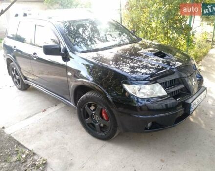 Черный Мицубиси Аутлендер, объемом двигателя 2 л и пробегом 216 тыс. км за 5600 $, фото 3 на Automoto.ua