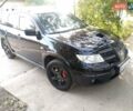 Черный Мицубиси Аутлендер, объемом двигателя 2 л и пробегом 216 тыс. км за 5600 $, фото 3 на Automoto.ua