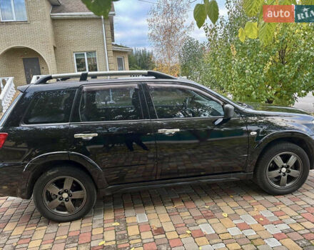 Чорний Міцубісі Аутлендер, об'ємом двигуна 2.38 л та пробігом 247 тис. км за 5499 $, фото 30 на Automoto.ua