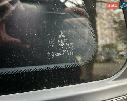 Чорний Міцубісі Аутлендер, об'ємом двигуна 2.38 л та пробігом 247 тис. км за 5499 $, фото 73 на Automoto.ua