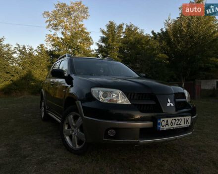 Мицубиси Аутлендер 2006 в Чернобае на Automoto.ua Черный Мицубиси Аутлендер, объемом двигателя 2.38 л и пробегом 278 тыс. км за 5300 $, фото 12 на Automoto.ua