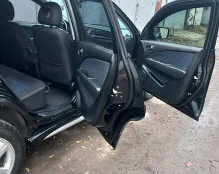 Черный Мицубиси Аутлендер, объемом двигателя 2.4 л и пробегом 256 тыс. км за 6900 $, фото 6 на Automoto.ua