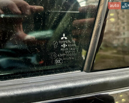 Чорний Міцубісі Аутлендер, об'ємом двигуна 2.38 л та пробігом 247 тис. км за 5499 $, фото 71 на Automoto.ua