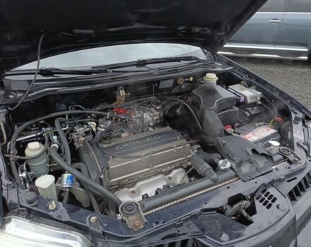 Черный Мицубиси Аутлендер, объемом двигателя 2 л и пробегом 200 тыс. км за 5100 $, фото 22 на Automoto.ua