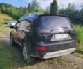 Чорний Міцубісі Аутлендер, об'ємом двигуна 2 л та пробігом 283 тис. км за 9000 $, фото 2 на Automoto.ua