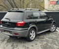 Черный Мицубиси Аутлендер, объемом двигателя 2.4 л и пробегом 242 тыс. км за 6800 $, фото 12 на Automoto.ua