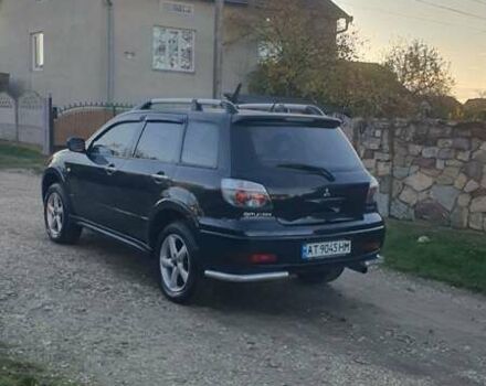 Міцубісі Аутлендер 2006 у Івано-Франківську на Automoto.ua Чорний Міцубісі Аутлендер, об'ємом двигуна 2 л та пробігом 263 тис. км за 7250 $, фото 17 на Automoto.ua