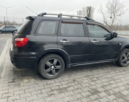 Черный Мицубиси Аутлендер, объемом двигателя 2.4 л и пробегом 234 тыс. км за 5499 $, фото 15 на Automoto.ua