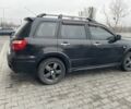 Черный Мицубиси Аутлендер, объемом двигателя 2.4 л и пробегом 234 тыс. км за 5499 $, фото 15 на Automoto.ua