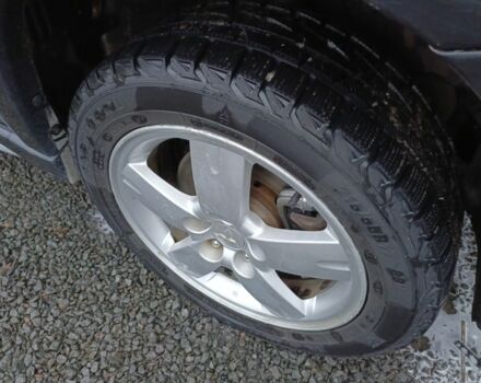 Черный Мицубиси Аутлендер, объемом двигателя 2 л и пробегом 200 тыс. км за 5100 $, фото 23 на Automoto.ua