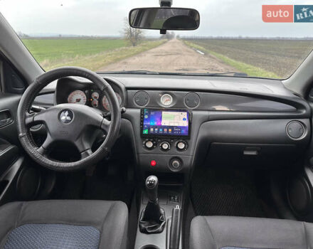 Черный Мицубиси Аутлендер, объемом двигателя 2 л и пробегом 230 тыс. км за 6300 $, фото 17 на Automoto.ua