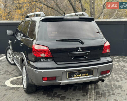 Черный Мицубиси Аутлендер, объемом двигателя 2.4 л и пробегом 242 тыс. км за 6800 $, фото 13 на Automoto.ua