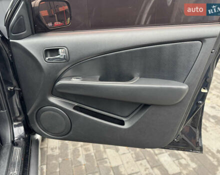 Черный Мицубиси Аутлендер, объемом двигателя 2.4 л и пробегом 242 тыс. км за 6800 $, фото 52 на Automoto.ua