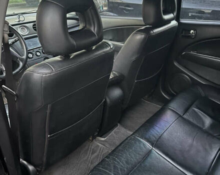 Чорний Міцубісі Аутлендер, об'ємом двигуна 2.38 л та пробігом 247 тис. км за 5499 $, фото 59 на Automoto.ua