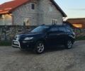 Міцубісі Аутлендер 2006 у Івано-Франківську на Automoto.ua Чорний Міцубісі Аутлендер, об'ємом двигуна 2 л та пробігом 263 тис. км за 7250 $, фото 1 на Automoto.ua