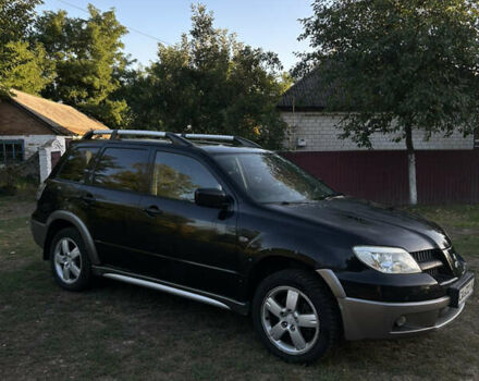 Мицубиси Аутлендер 2006 в Чернобае на Automoto.ua Черный Мицубиси Аутлендер, объемом двигателя 2.38 л и пробегом 278 тыс. км за 5300 $, фото 3 на Automoto.ua