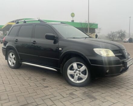 Чорний Міцубісі Аутлендер, об'ємом двигуна 2.4 л та пробігом 277 тис. км за 6700 $, фото 1 на Automoto.ua